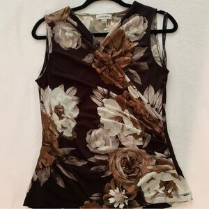 Calvin Klein short sleeve top. Size small. Never worn.